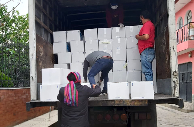 Food relief boxes arrive at the Child Aid regional office in Totonicapán, Guatemala.