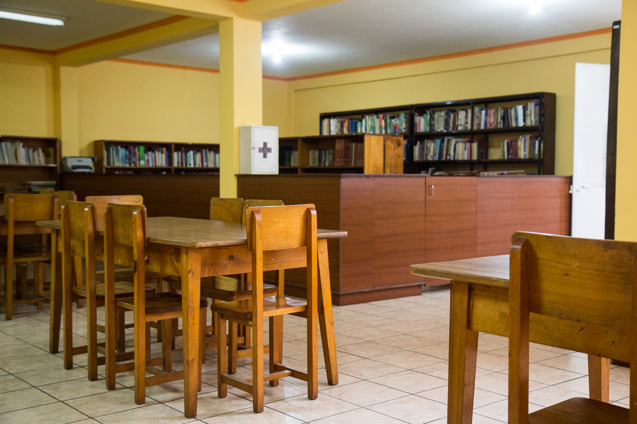 Like many Guatemalan libraries, the Municipal library in Patzun keeps its small collection of books behind a counter and out of reach of patrons.