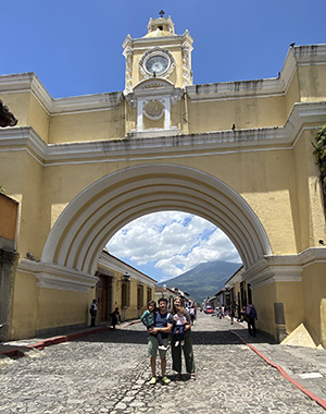 The de Leon family under the arch in Antigua, Guatemala